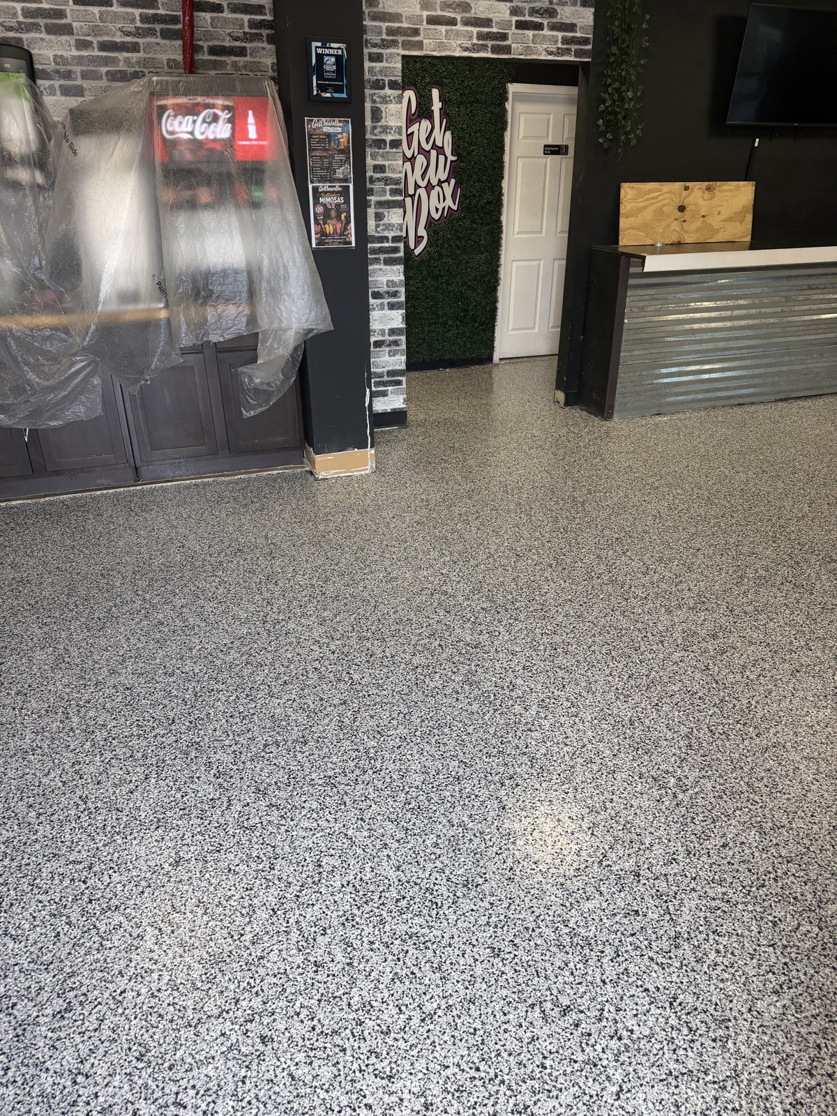 Decorative flake floor at restaurant counter area